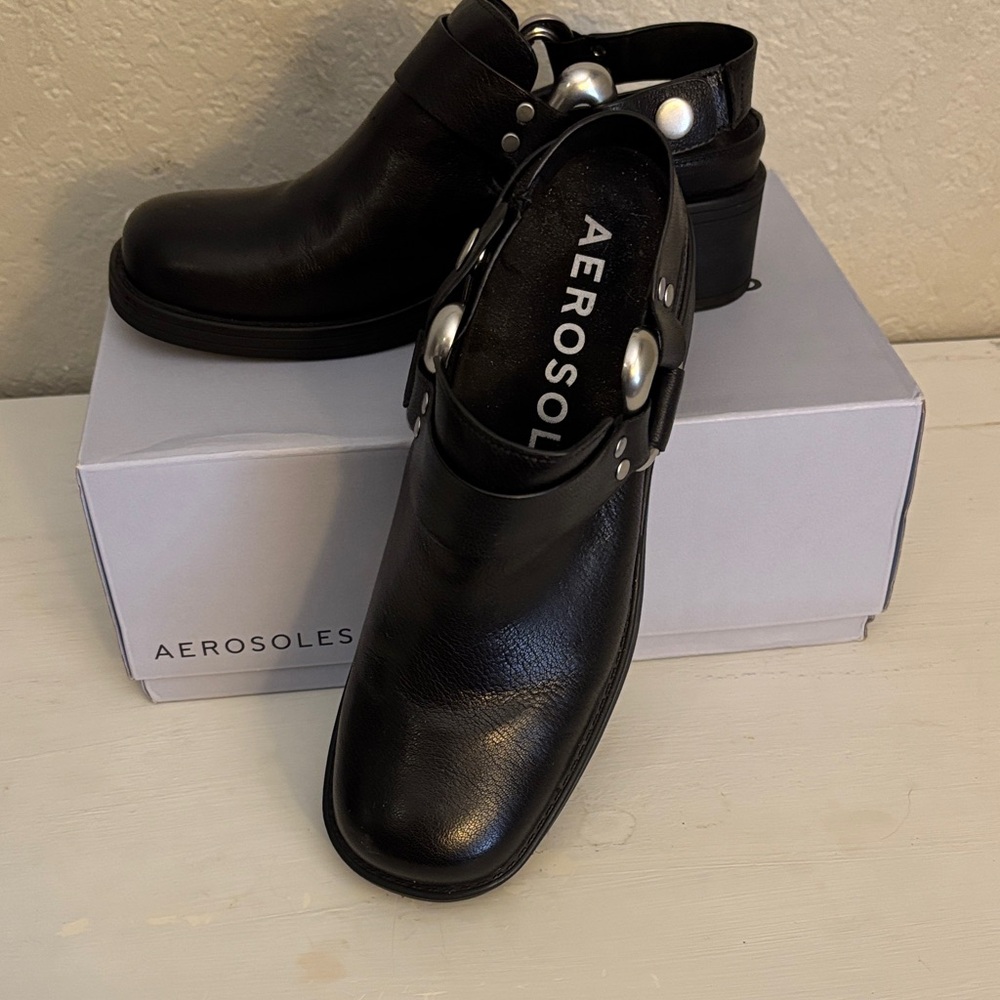 AEROSOLES Women's Black Leather Mules with Silver Accents